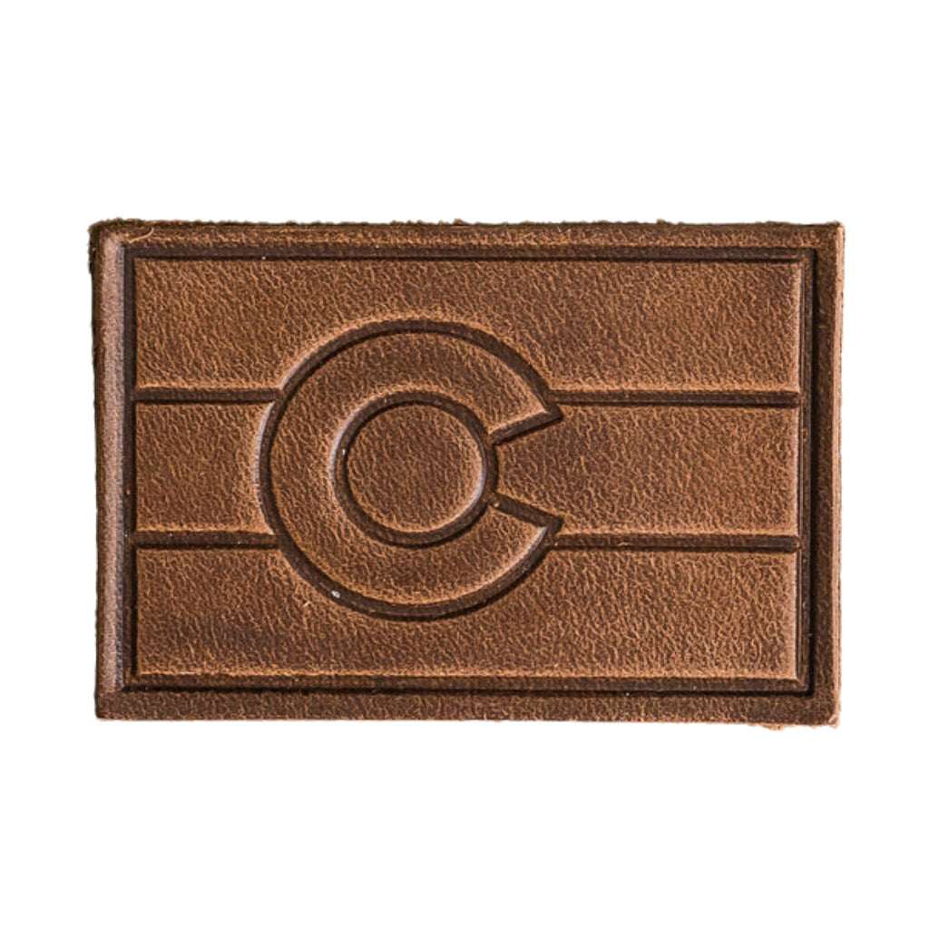 Colorado Patch - Cafe Leather, Handmade with High-Quality Full-Grain Leather with Velcro® brand backing, this leather Colorado velcro patch, 2" x 3" sized perfectly for our tactical/ operator caps, backpacks and jackets. Made in the USA.