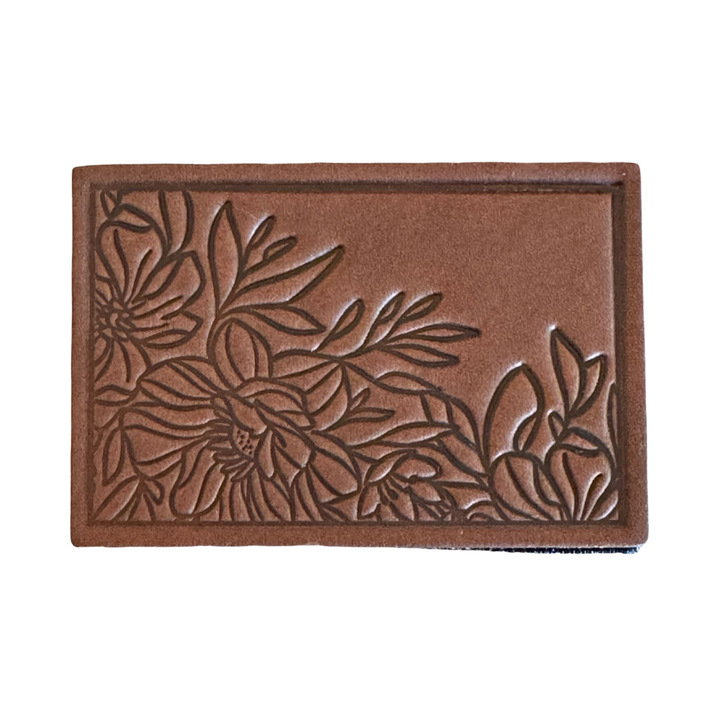  Floral Patch - Natural Dublin Leather Handmade with High-Quality Full-Grain Leather with Velcro® brand backing, this leather stamped flower design velcro patch, hiking Patch is 2" x 3" sized perfectly for our tactical/ operator caps, backpacks and jackets. Made in the USA.