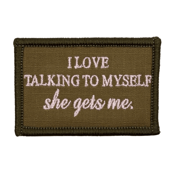 Brown patch with pink text 'I LOVE TALKING TO MYSELF she gets me.' on a brown background