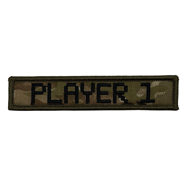 Camouflage Embroidered 1"x5" patch with 'PLAYER 1' text in black on a multicam background