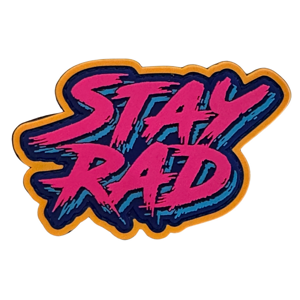 Stay Rad Text Morale PVC Patch - Pink, Hook fastener material sewn on the back, Size 3" x 2.47" 80s Stay Rad PVC Patch.
