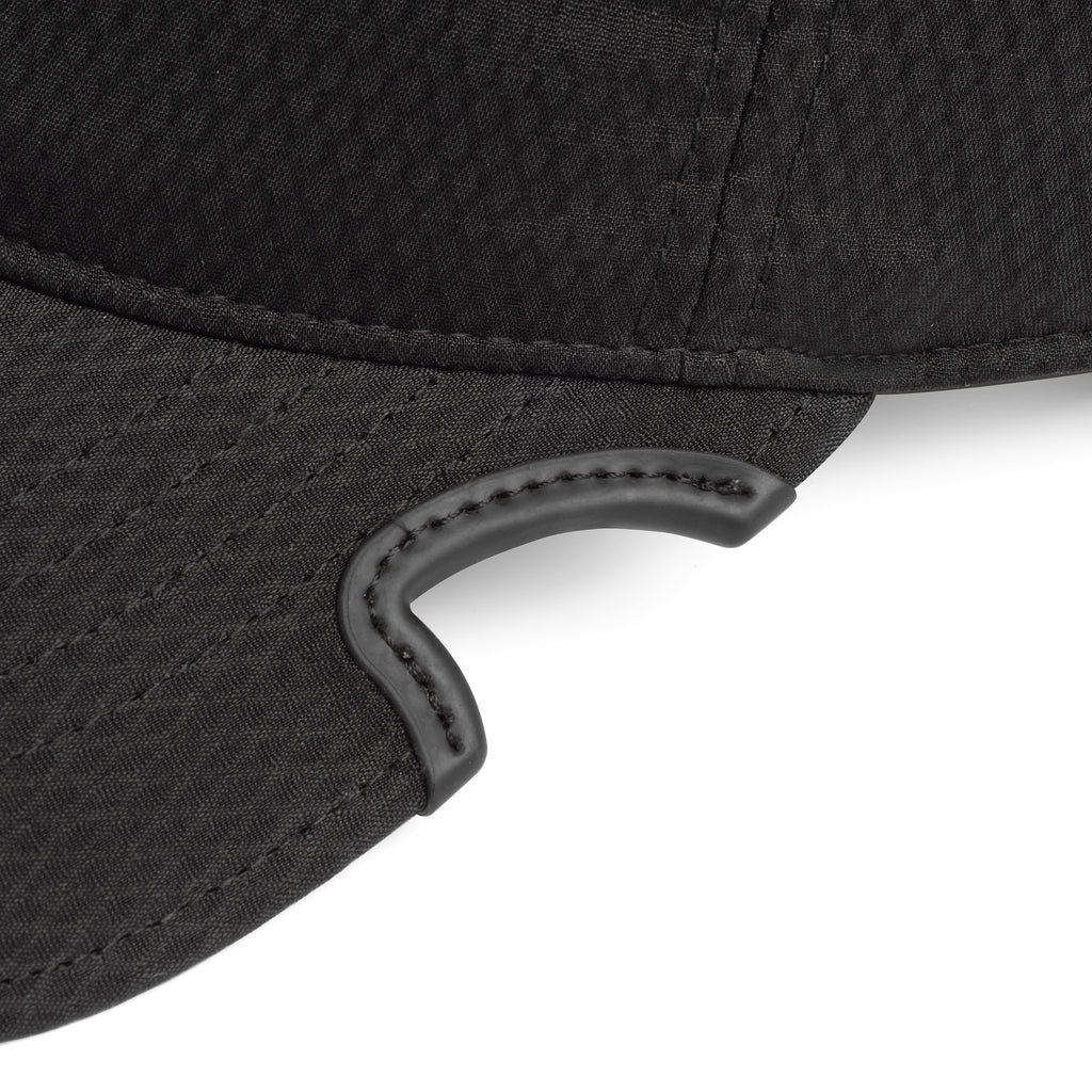Side view of Notch Athlete Black Blank cap showing patented notch and unstructured low profile fit