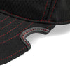 Side view of Notch Athlete Operator Black Red cap showing patented notch 