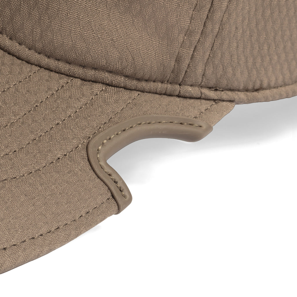 Side view of Notch Athlete Operator Coyote Brown cap showing patented notch and low profile fit