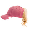 Close-up of Notch Pink Ponytail cap back slot opening for pulling ponytail or bun through
