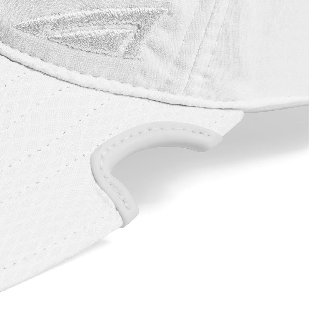 Side view of Notch Athlete White Ponytail cap showing patented notch and unstructured low profile fit