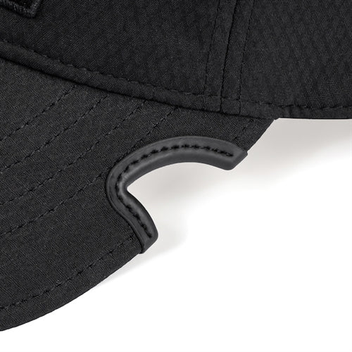 Side view of Notch Athlete Operator Blackout cap showing patented notch and low profile fit